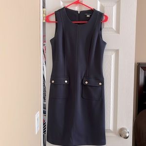 Tommy Hilfiger knee length dress with a zipper in the back and two from pockets
